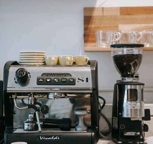 home espresso machine setup on kitchen countertop — best coffee gadgets for home