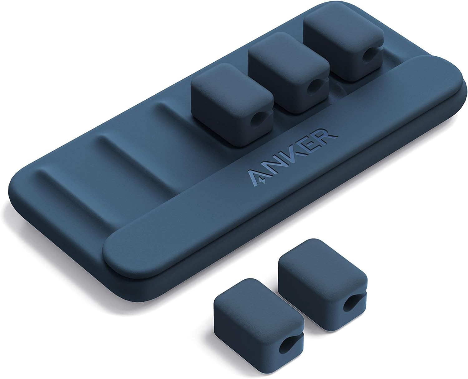 Anker magnetic cable holder clips securing charging cables on a desk edge