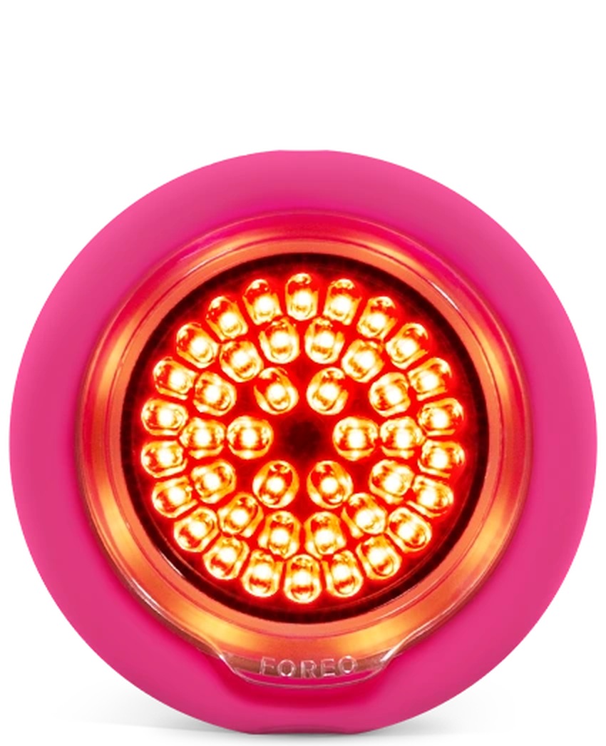 FOREO UFO 3 LED compact pink skincare device with visible red LED lights