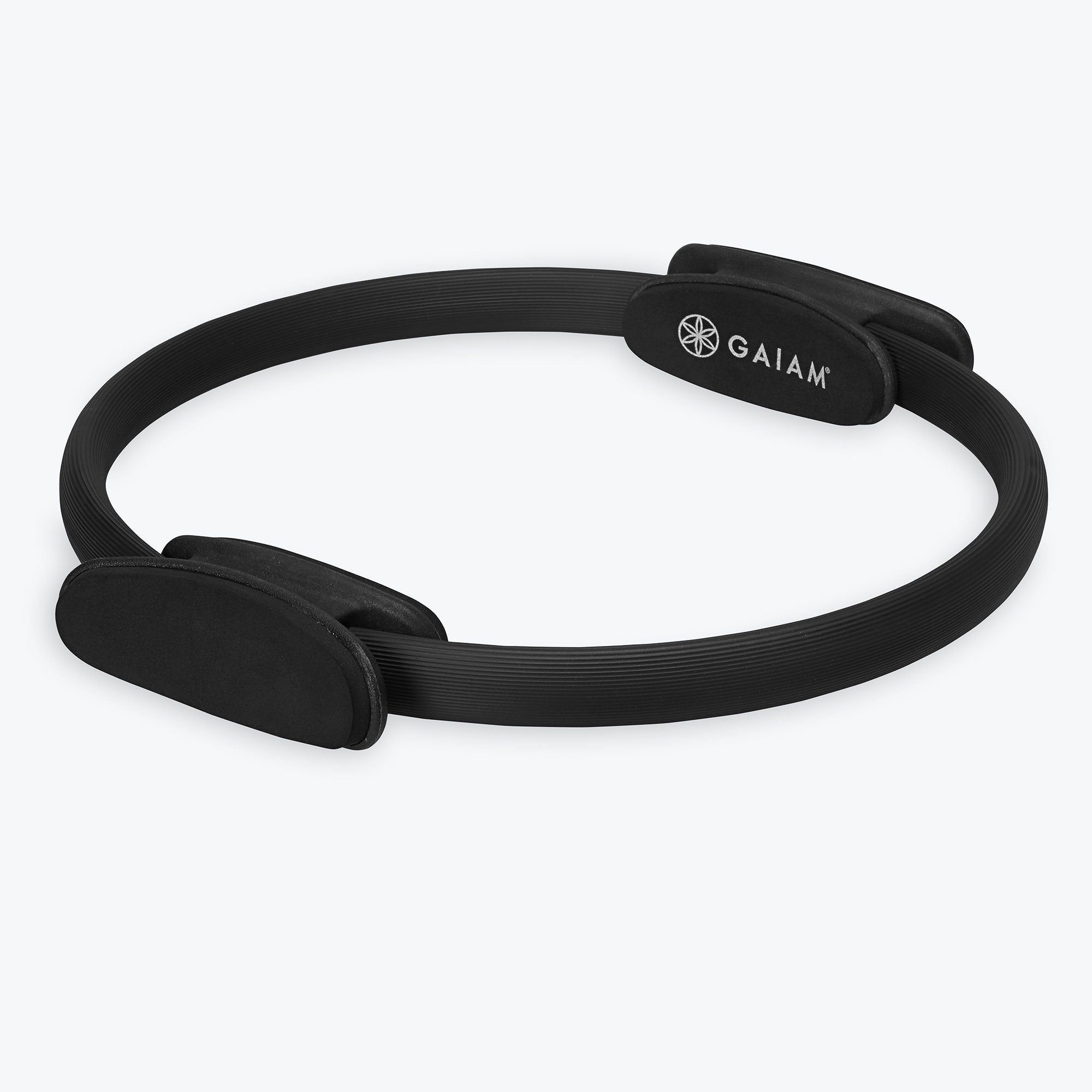 Gaiam Pilates Ring, black toning ring with padded handles and Gaiam branding