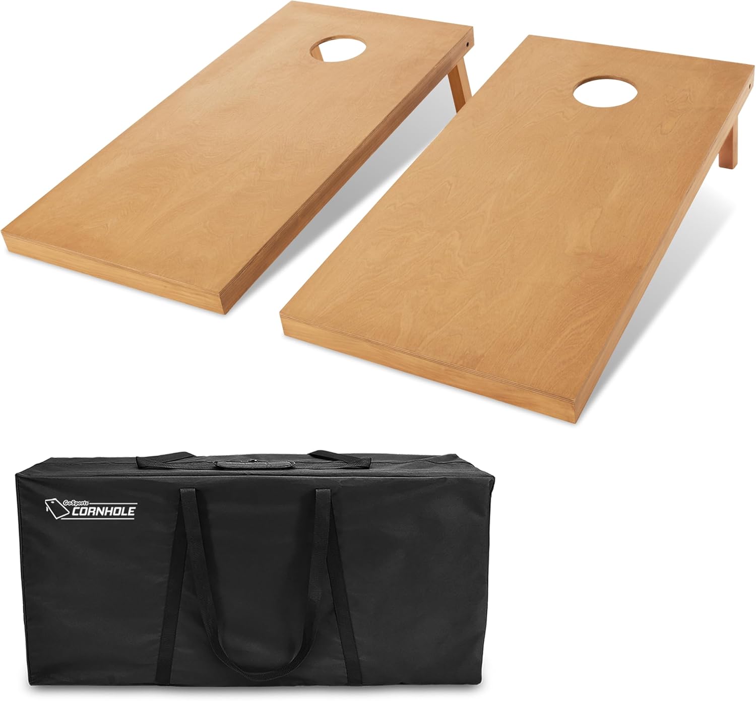 Regulation size wooden cornhole boards with bean bags on grass