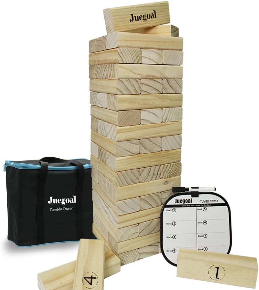 Giant wooden toppling tower blocks stacked up on a lawn