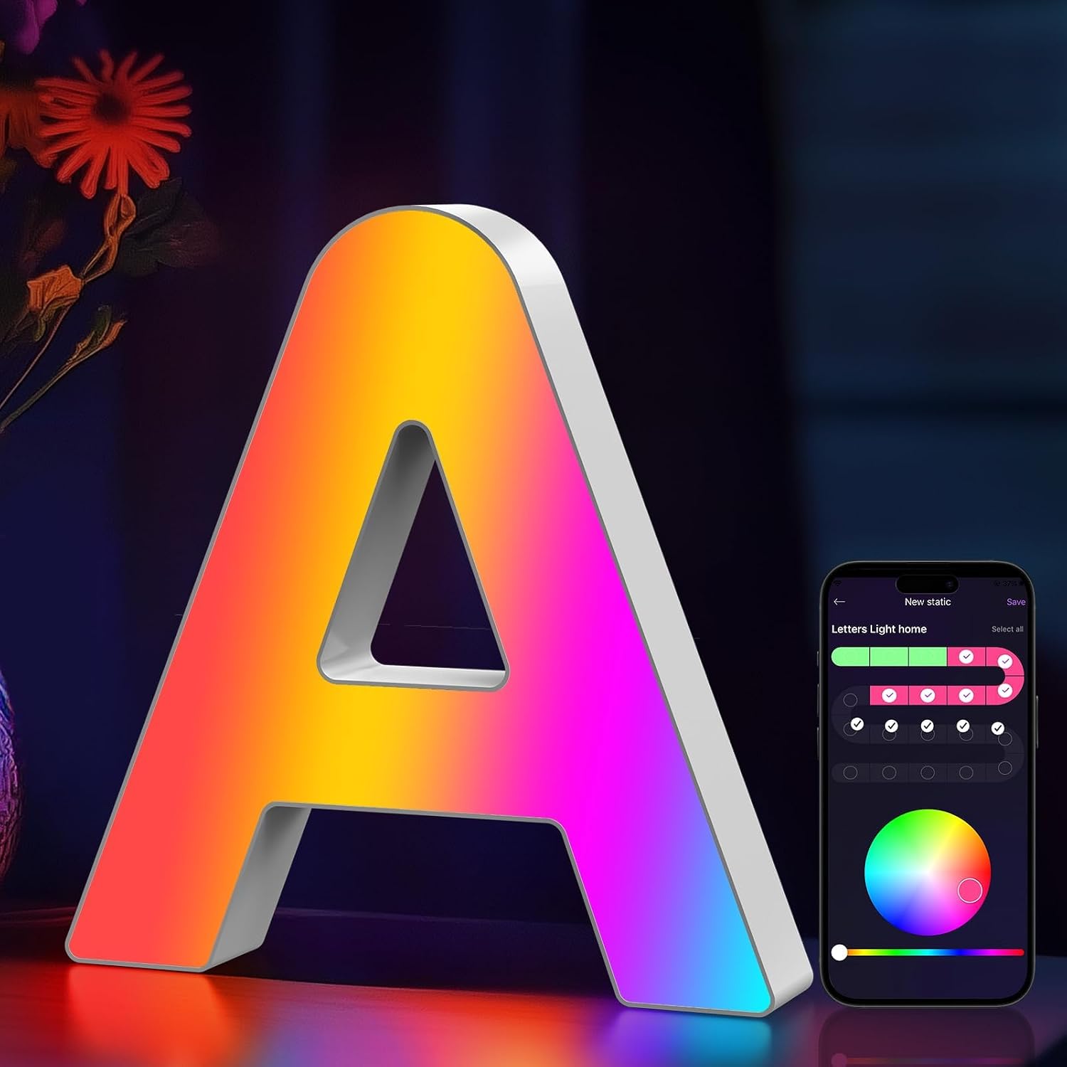 Glowing color-changing LED marquee letter A on a nightstand