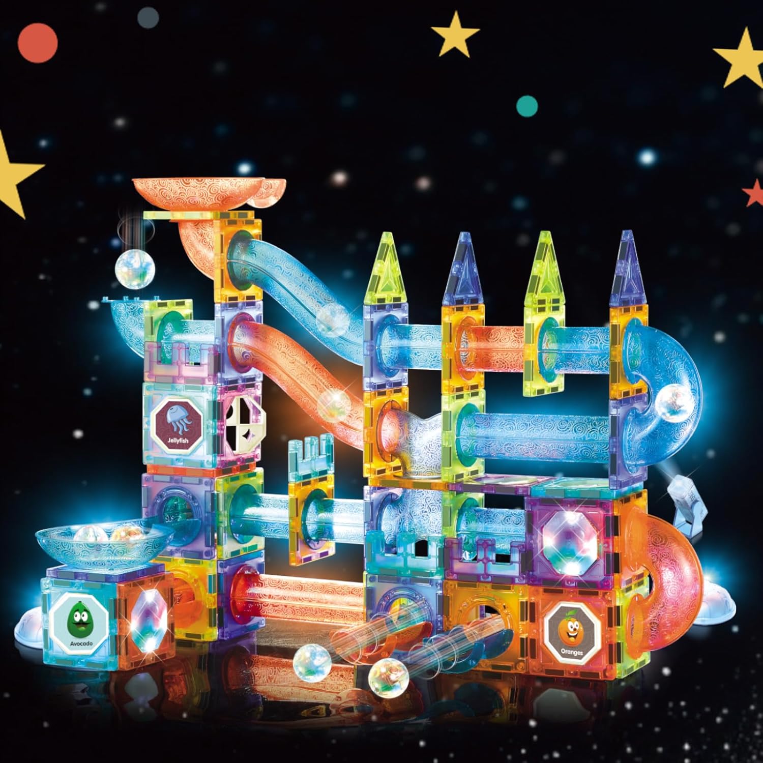 Colorful magnetic building tiles set built into a glowing LED marble run tower