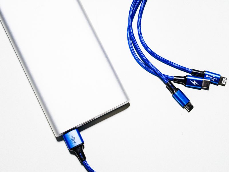 portable power bank with charging cables product photo