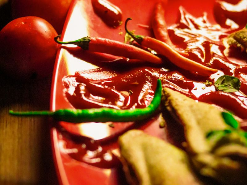 fresh red and green chili peppers, a spicy food ingredient