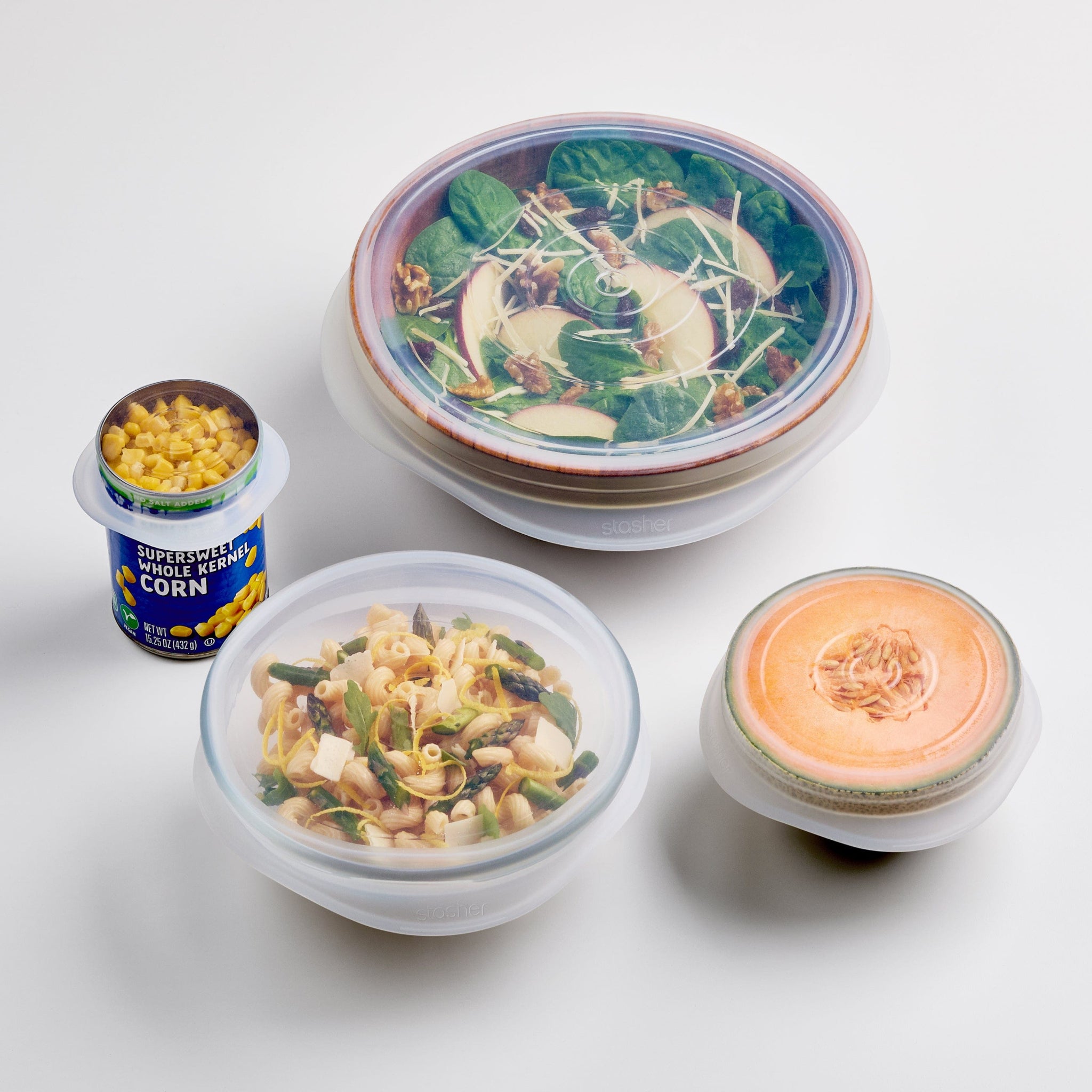 silicone stretch lids covering bowls of food product photo