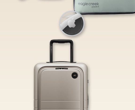 Collage of travel packing essentials: Monos carry-on suitcase, Trtl travel pillow, Eagle Creek packing cube, and Apple AirTag