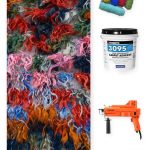 A finished colorful tufted rug alongside the materials needed to make one: tufting yarn skeins, a Roberts 3095 carpet adhesive bucket, a VEVOR 2-in-1 tufting gun, and a monks cloth backing swatch