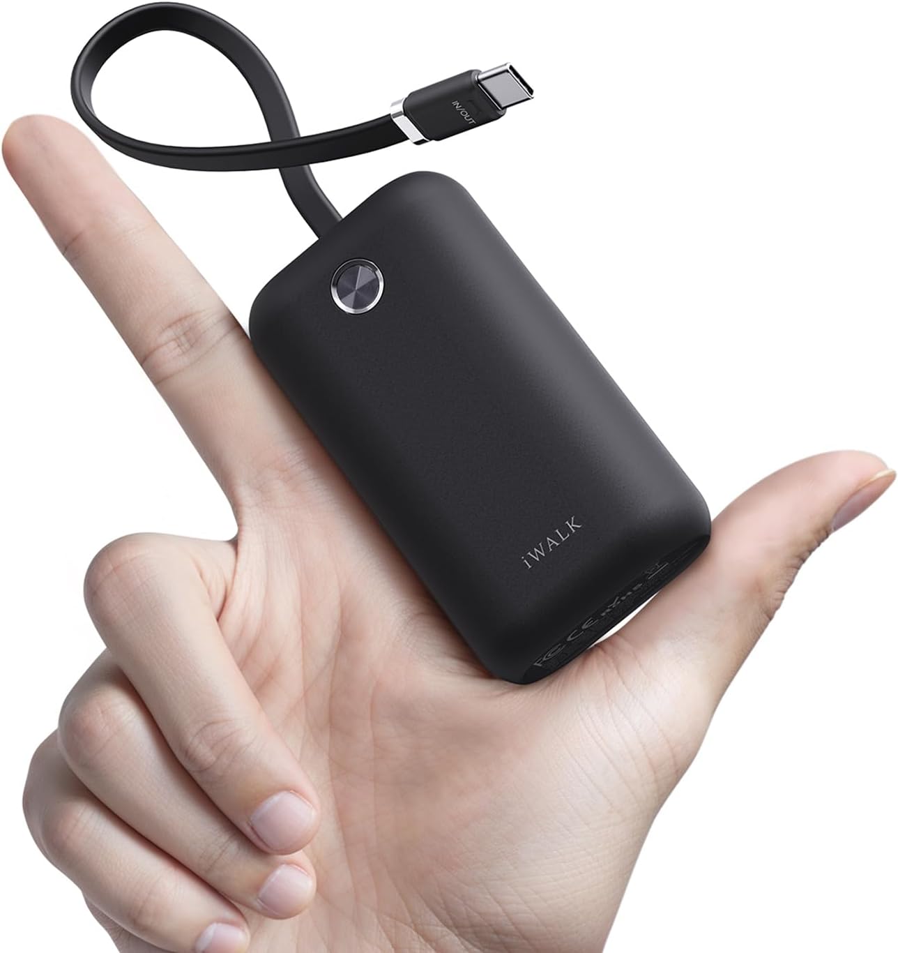 iWALK mini portable charger with built-in USB-C cable held in a hand for scale